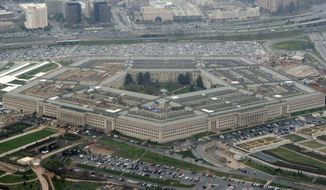 This March 27, 2008, file photo shows the Pentagon in Washington. (AP Photo/Charles Dharapak, File) ** FILE **
