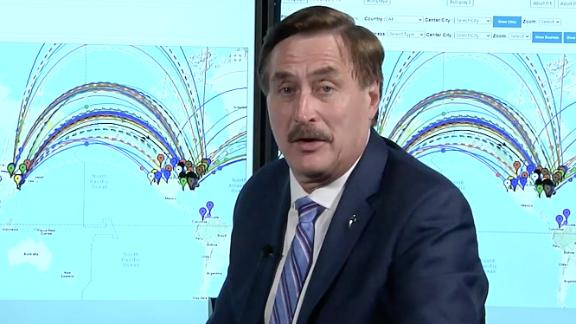 Mike LIndell appearing in a scene from his video, "Absolute Proof."