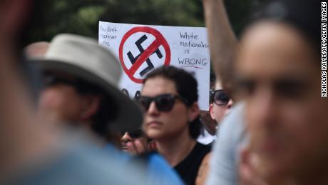 Demonstrators opposed to a far-right rally near the White House gather on August 12, 2018, one year after deadly violence at a similar protest in Charlottesville, Virginia.