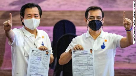 Manila Mayor Francisco Domagoso, right, known by his screen name Isko Moreno, and his running mate for vice president Willie Ong in Manila on October 4.