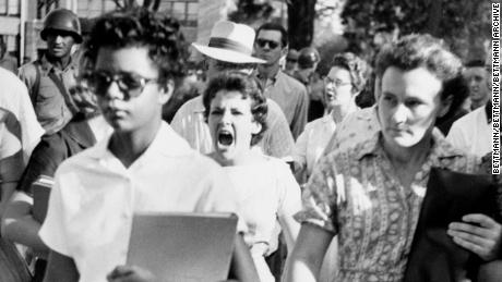 Elizabeth Eckford, one of the &quot;Little Rick Nine,&quot; ignores the jeers and stares of fellow students on her first day of class at Little Rock's Central High School in 1957.