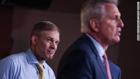 Rep. Jim Jordan listens as House Minority Leader Kevin McCarthy speaks at a news conference in July 2021 in Washington, DC. 