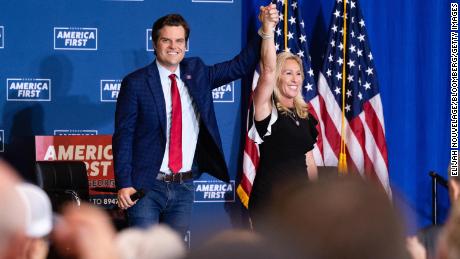 Reps. Matt Gaetz, a Republican from Florida, left, and Marjorie Taylor Greene, a Republican from Georgia, are seen in Dalton, Georgia, in May 2021. 