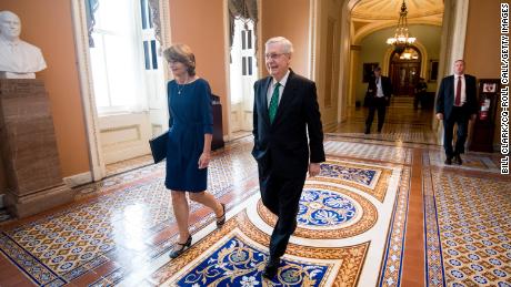 Sen. Lisa Murkowski and McConnell walk to McConnell's office in the Capitol after a vote in October 2018.