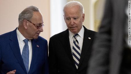 President Joe Biden departs from the US Capitol with Senate Majority Leader Chuck Schumer in July 2021. 