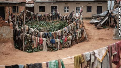 This photo taken on April 9, 2019, shows victims' clothes recovered from pits used as mass graves during the 1994 Rwandan genocide and hidden under houses in Kabuga, on the outskirts of Kigali.