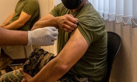 Pentagon officially rescinds Covid-19 vaccine requirement for troops