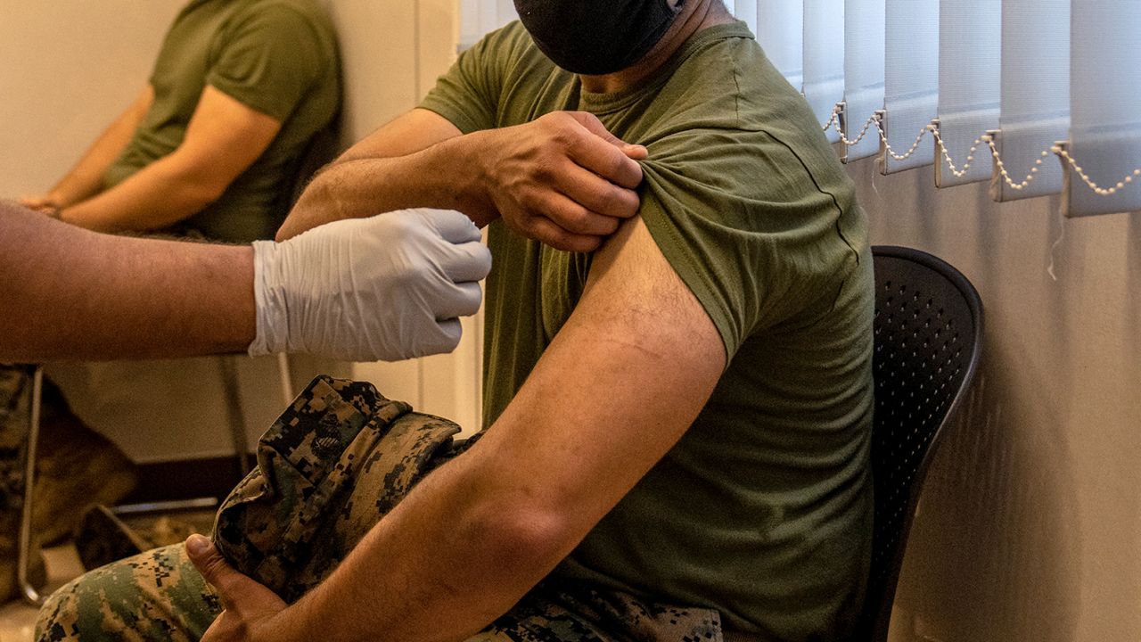 Pentagon officially rescinds Covid-19 vaccine requirement for troops